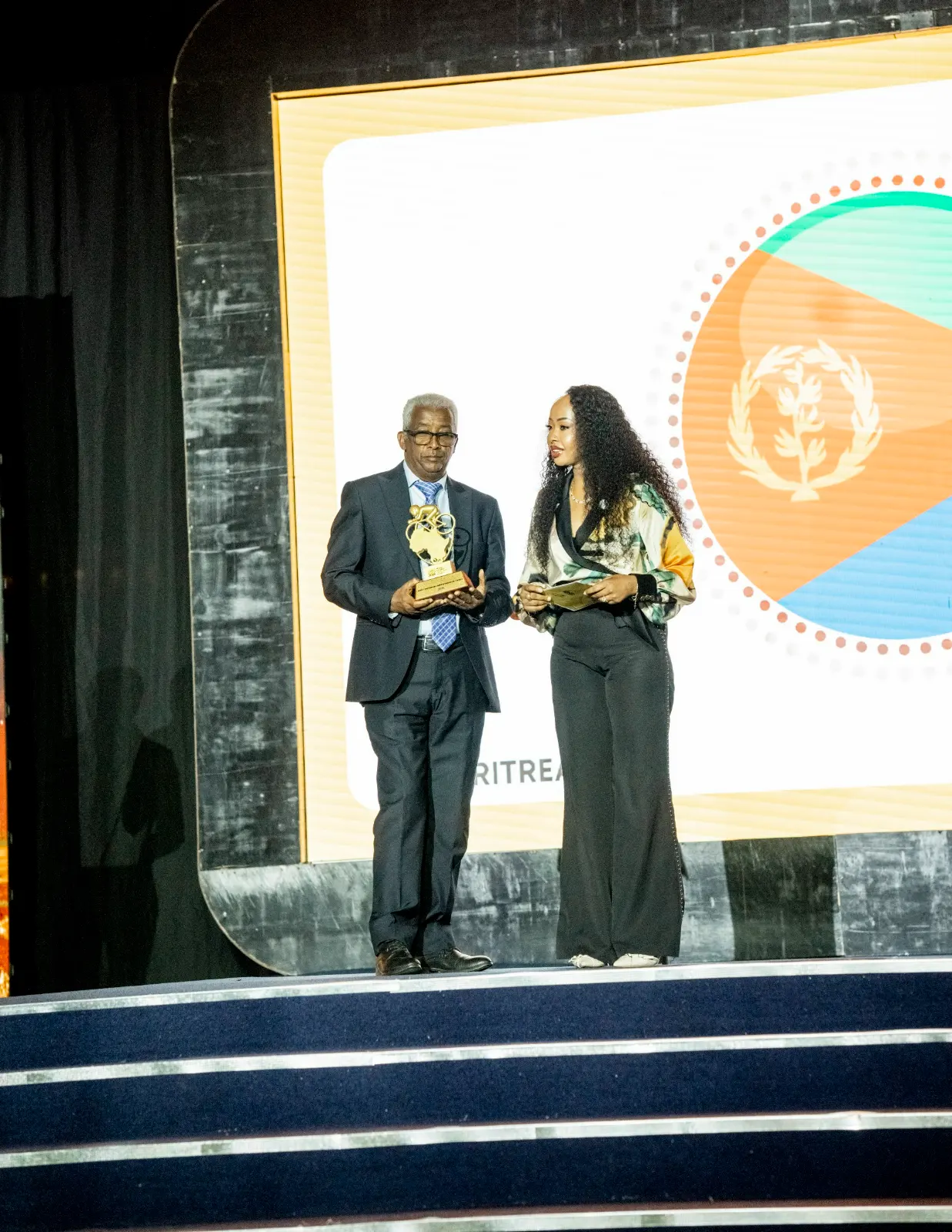Presenting the National Team award to Eritrea, with Ingufu Gin